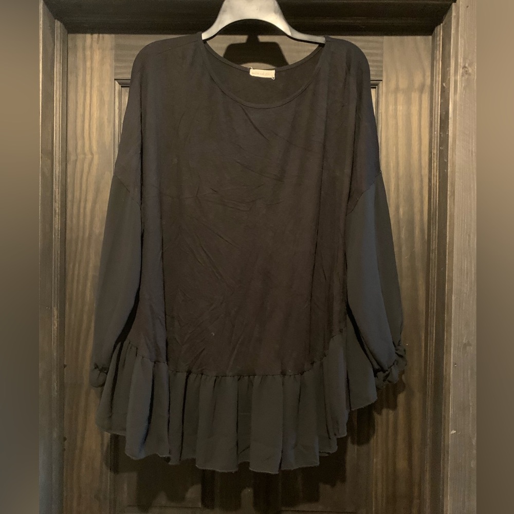 Black ruffled top with sheer sleeves